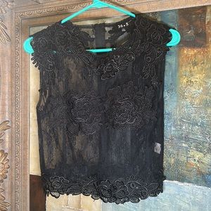 Black sheer lace embellished midriff top